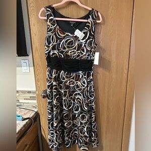 Sleeveless dress with detachable jacket